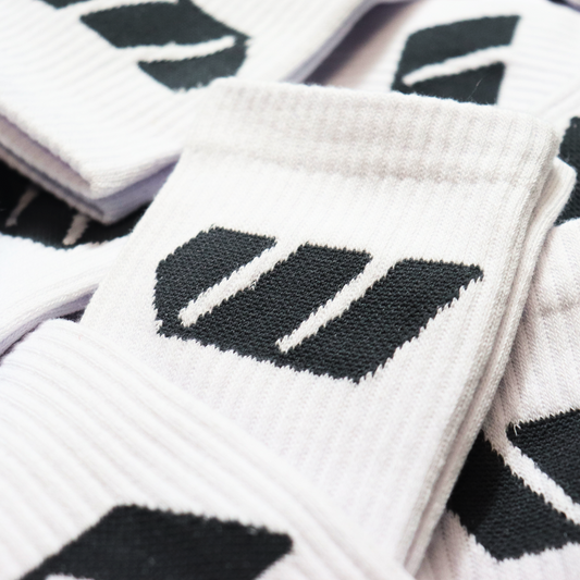 The DUBYA crew socks bring comfort and streetwear together. Medium cushioning in the heel and footbed give your feet the breathability to stay comfortable all day. This sock's neutral color makes it wearable with any of our your favorite footwear brands. Premium socks, made for us.